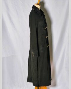 Damen Suede Trenchcoat black suede coat side profile with double-breasted button closure and flap pocket